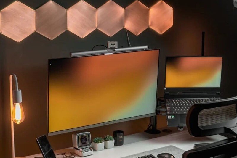 Nanoleaf Elements installed behind a monitor.